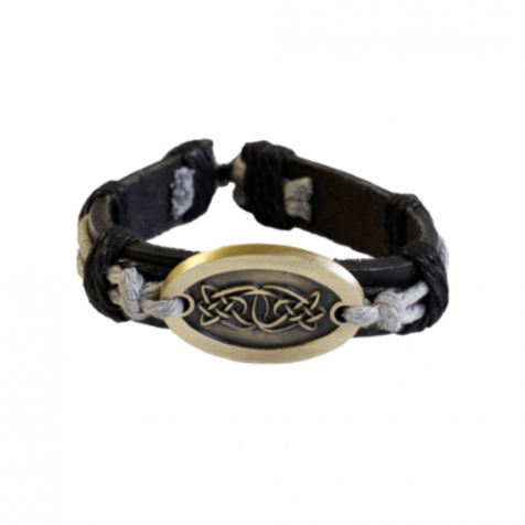 Men's leather cuff with brass celtic pattern